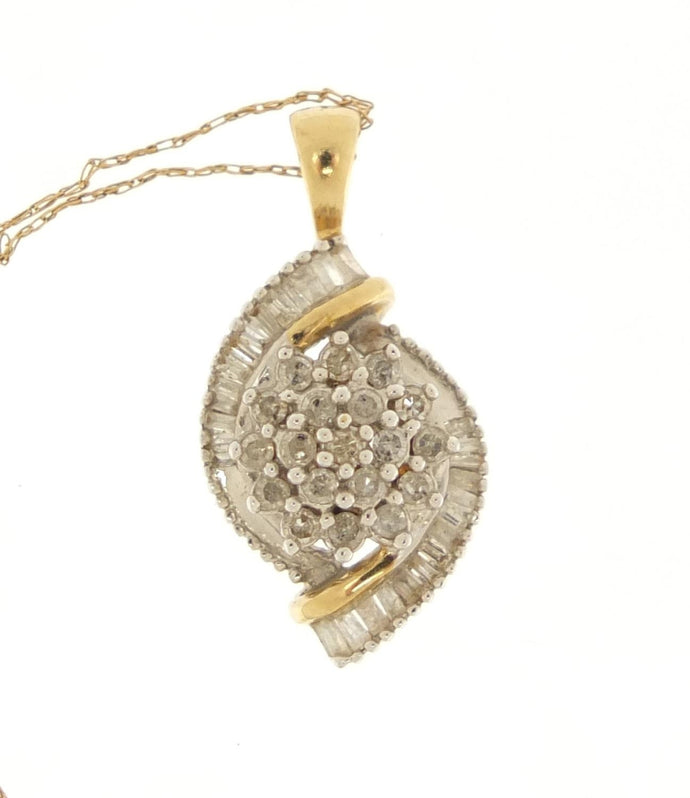 Gold diamond cluster pendant on a 9ct gold necklace