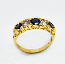Load image into Gallery viewer, An early 20th century 18ct gold 5-stone sapphire and diamond half hoop ring

