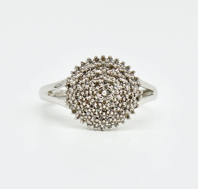 A 9ct white gold diamond cluster dress ring