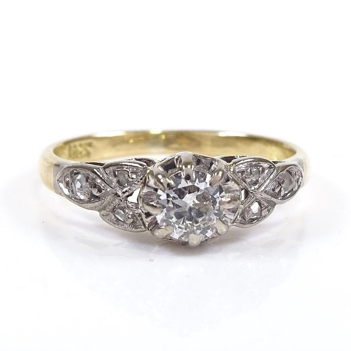 An early 20th century 18ct gold solitaire diamond ring