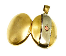 Load image into Gallery viewer, Victorian large gilt locket set with a coral cabochon
